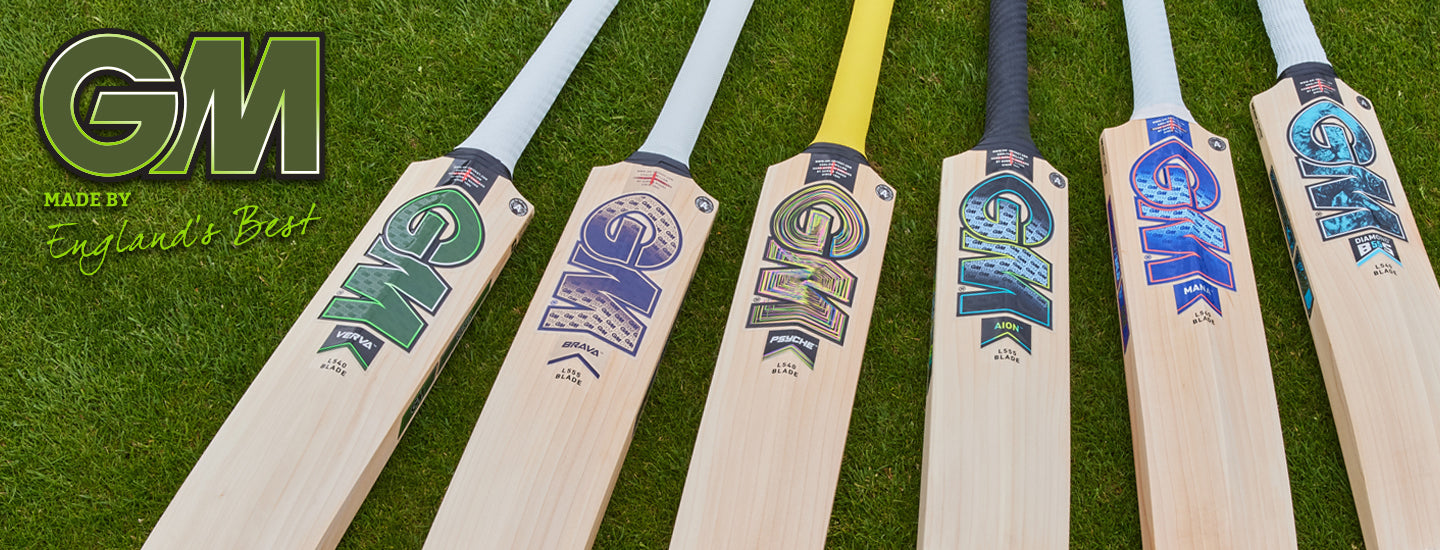 Row of cricket bats with GM branding on a grass background
