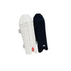 A pair of cricket leg guards, one with a white cover and one with a black cover, both featuring the Gray Nicolls logo.